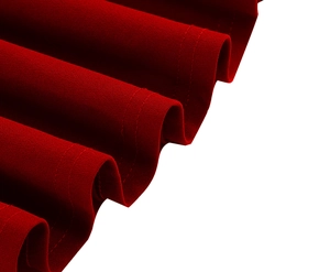 Detail of deep red dress fabric showing textured weave and neat double-stitched hem finish