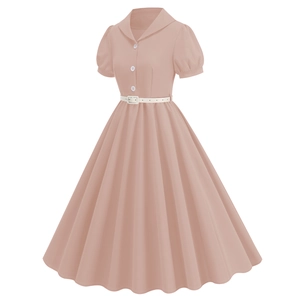 Detail of light pink vintage dress featuring a lapel collar, puff sleeves and a belted waist