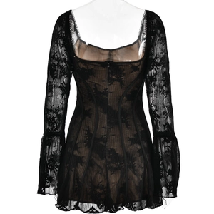 Détails de la robe en dentelle noire avec baleines de corset et texture florale
