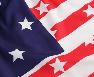 Detailed close-up showing the star and stripe pattern on the Independence Day dress fabric