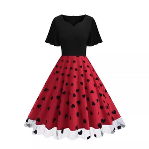 Vintage 50s Audrey Hepburn style cocktail dress with heart print and mesh splice