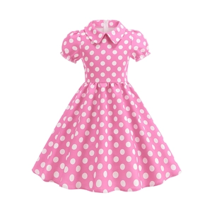 Detailed back view of a pink polka dot girl's dress featuring an invisible zipper and Peter Pan collar