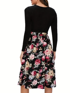 Vintage floral patchwork long sleeve dress featuring a black top and high waist A-line skirt