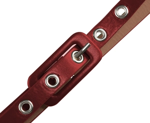 Macro shot of dark red litchi grain leather belt with matching covered buckle and eyelets