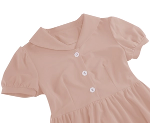 Detailed view of puff sleeves and waist pleats on elegant mauve short-sleeved dress