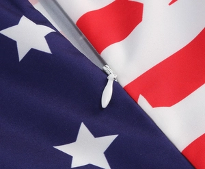 Detail of invisible zipper stitching on vintage American flag print summer dress