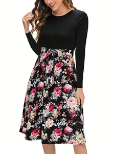 Women's vintage floral patchwork long sleeve dress with black bodice and belted waist