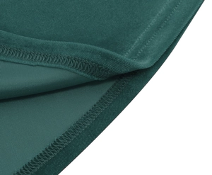 Detailed macro view of dark green velvet fabric texture and professional twin-needle stitching