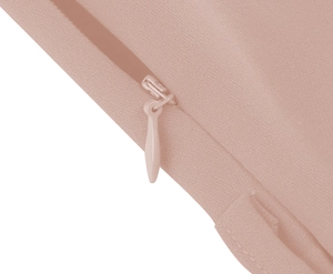 Detail shot of the hidden zipper on a vintage pink short-sleeved summer dress