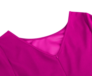 Detail of the V-neckline and matching invisible zipper on a magenta vintage dress