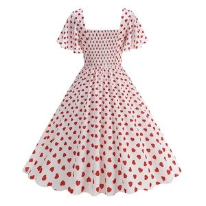 Detail of square neckline and elastic smocked bodice on white heart print vintage dress