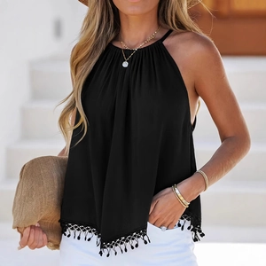 Detailed view of women's black halter neck top with elegant fringe hem and textured fabric