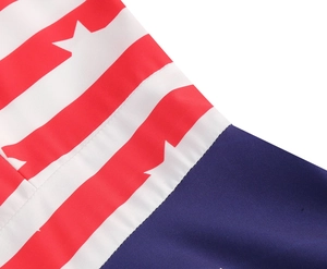 Detail shot showing the stitching of US flag patterns and blue fabric on the dress