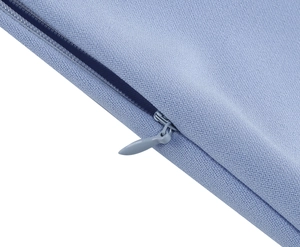 Detailed macro view of the light blue dress fabric with a hidden invisible zipper