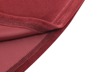 Detail of burgundy velvet fabric with professional overlock stitching and soft luster