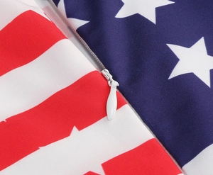 Detailed macro view of invisible zipper closure on American flag pattern dress fabric