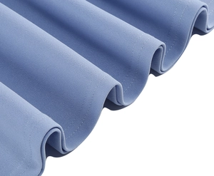 Close-up of sky blue fabric texture with professional double-stitched hem and wavy folds