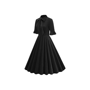 Detail of vintage black midi dress showing the bow tie collar and elegant retro waistline