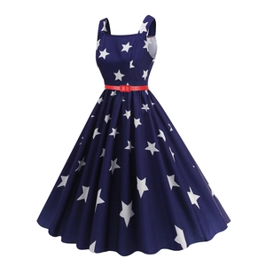 Detail of vintage sleeveless blue dress with white stars and a thin red leather belt