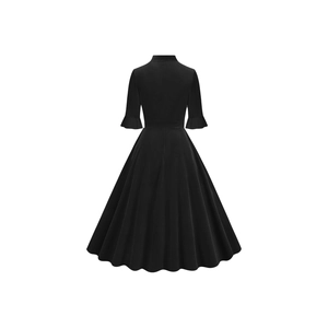 Detailed back view of a vintage black midi dress featuring elegant ruffled half sleeves