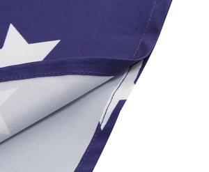 Detail of double-stitched hem and white star patterns on American flag dress