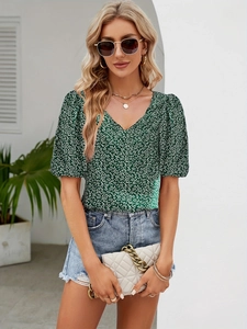 Elegant green floral V-neck puff sleeve blouse for women with a casual summer aesthetic