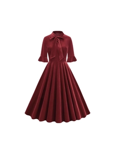 Elegant burgundy velvet midi dress with retro bow tie and vintage A-line silhouette