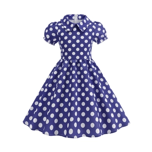 Detailed view of girls royal blue polka dot dress with classic Peter Pan collar