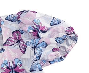 Close-up of girls' dress elastic sleeve with colorful butterfly print and puff style