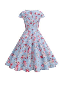 Rear view of vintage light blue floral dress with short sleeves and full flared skirt
