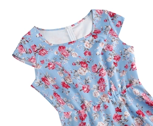 Detail of round neckline and floral print on summer short sleeve dress fabric