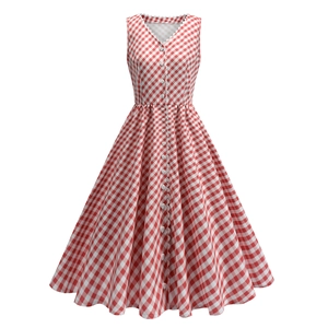 Detail of red and white plaid dress featuring scallop trim V-neck and heart buttons
