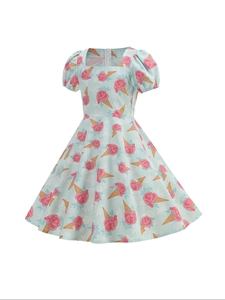 Detailed view of puff sleeves and floral ice cream print on girls' blue princess dress