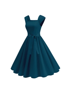 Detail of vintage navy blue A-line dress featuring square neck and elegant waist bow belt