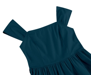 Detail of square neckline and pleated waist on this dark teal sleeveless cotton dress