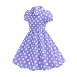 Detail of lavender purple girl's dress with white polka dots and Peter Pan collar