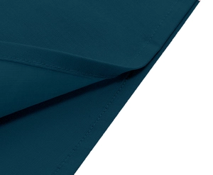 Detailed macro shot of dark blue fabric texture with durable double needle flat stitching