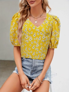 Elegant yellow V-neck floral top with puff short sleeves and white daisy print