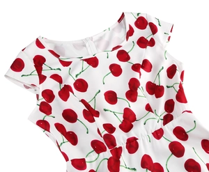 Detail of white short sleeve dress with red cherry print and invisible back zipper