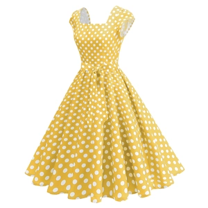 Détails de la robe vintage jaune à pois avec col carré et ceinture à nouer à la taille