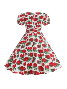 Back view of girls strawberry print dress featuring puffed sleeves and zipper detail