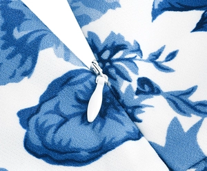 Close-up of the high-quality invisible white zipper on blue floral linen cushion cover