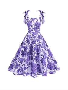 Elegant white sundress with purple floral print, tie-up straps and high waist design