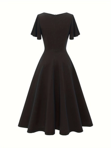 Back view of a black A-line midi dress with butterfly sleeves and hidden zipper