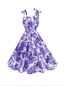 Detail of vintage purple floral print A-line dress with adjustable tie-up straps and flare hem