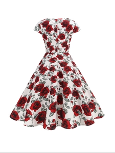 Detail view of the back with hidden zipper on this vintage rose floral midi dress