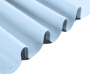 Close-up of light blue cotton fabric showing fine knitted texture and soft wavy folds