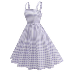 Detail of vintage pink gingham midi dress featuring retro A-line skirt and wide straps