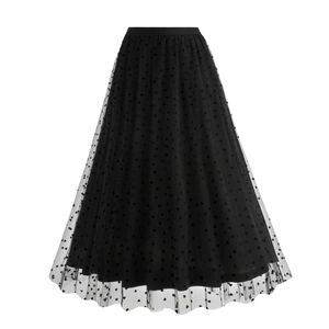 Close-up of black tulle midi skirt featuring flocked heart patterns and elastic waistband