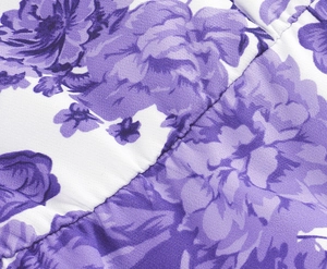 Close-up of elegant purple floral print fabric with high-quality stitching detail